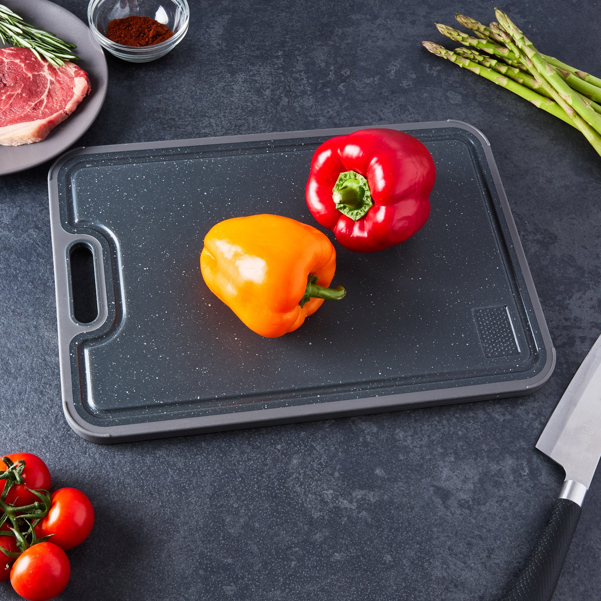 Chopping peppers on the polypropylene side of the board